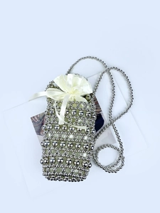 Handmade silver beaded crossbody mini bag with satin drawstring liner and bead strap