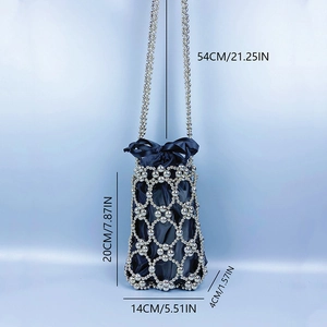 Detail of silver beaded bucket bag with blue satin drawstring pouch and size labels
