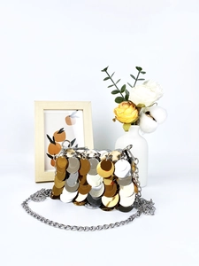 Chic mini sequin chain bag with gold and silver metallic discs for stylish evening wear