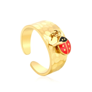 Hammered gold open ring featuring a vintage ladybug and abstract heart charms