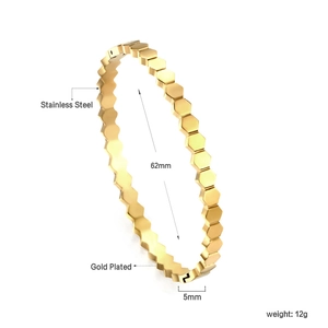 Detail of 5mm wide honeycomb pattern gold plated stainless steel bangle with dimensions