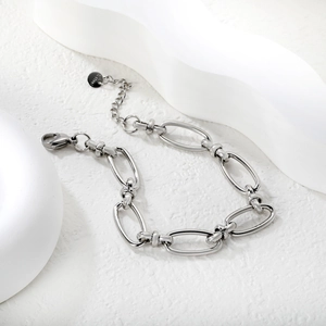 Detail of silver stainless steel thick link chain with lobster clasp and extension