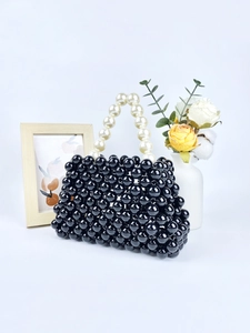 Handgefertigte schwarze Perlenhandtasche mit cremefarbenem Perlengriff im Vintage-Stil