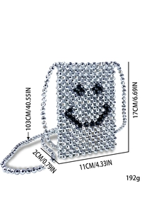 Detail of silver beaded smiley face bag with size measurements 17x11x2cm and strap length
