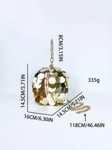 Detailed dimensions of a sphere evening bag with gold sequins and a round metal handle
