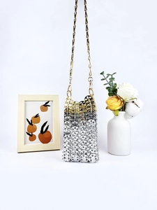 Handcrafted woven metal ring crossbody phone bag with gold and silver chain strap