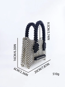 Silver and black beaded handbag with dimensions 20x6x16cm and elegant pearl handle