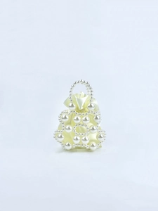 Detailed view of handmade beaded pearl handbag with satin drawstring lining
