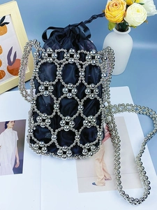 Handcrafted silver beaded woven crossbody bag with blue satin drawstring pouch and chain