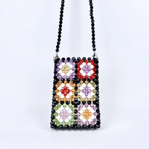 Detail of colorful granny square beaded crossbody bag with vibrant acrylic beads