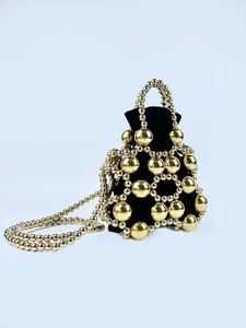 Elegant gold metal beaded bucket bag with black velvet lining and chain strap
