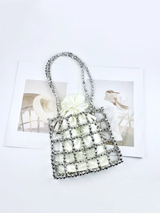 Handmade beaded handbag with silver metallic hollow grid and cream satin drawstring pouch