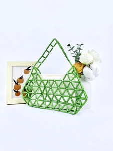 Green beaded handmade handbag with geometric hollow structure and inner fabric pouch