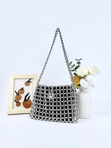 Handcrafted silver beaded shoulder bag with metallic grid weave and a long chain strap