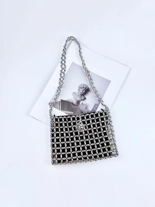 Handmade silver beaded shoulder bag with metallic mesh structure and black inner lining