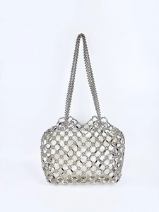 Detail of silver metallic beaded tote with a removable white drawstring inner pouch