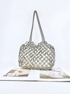 Silver bead-woven handbag with mesh hollow design and white inner drawstring pouch
