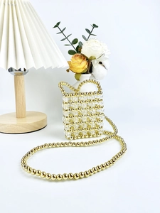 Mini beaded handbag with gold and crystal beads, round handles and crossbody chain