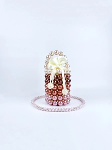 Handmade gradient pearl bucket bag with satin bow and top handle for women