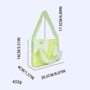 Detailed size specifications of the green beaded handbag with measurements and weight details