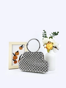 Exquisite silver beaded handbag with round metal handle and handmade weave pattern