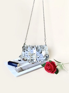 Sparkling silver sequin chain bag with metallic fish-scale design for evening events