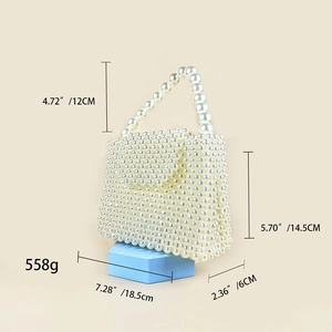 Detailed size specifications for a handmade pearl bead handbag with height and weight data