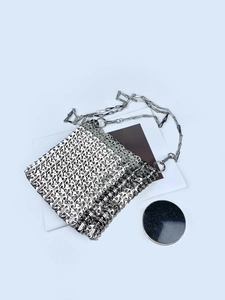 Chic silver metallic chainmail shoulder bag with glossy finish and metal chain strap
