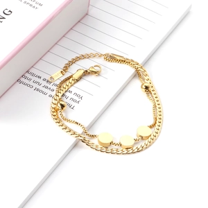 Double-layered 18k gold plated stainless steel bracelet with snake chain and round charms