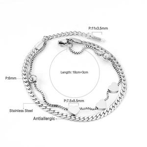 Detail view of double-layer stainless steel bracelet showing heart charms and dimensions