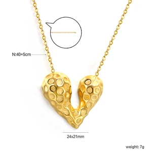 Minimalist gold heart pendant necklace with hammered texture finish and adjustable chain
