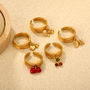 5-piece gold adjustable ring set featuring cherry, heart, star, moon, and pearl charms