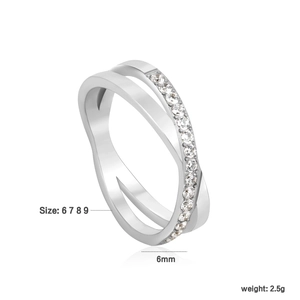 Close-up of 6mm wide criss-cross ring showing cubic zirconia detail and size specs