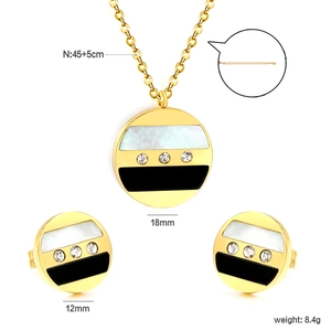 Détails de la parure ronde en or avec incrustation de nacre et dimensions du produit