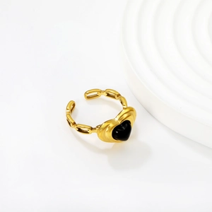 Gold plated open ring featuring a black heart gemstone and hollow chain band design