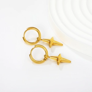Polished gold stainless steel hoop earrings with north star dangles on white stand