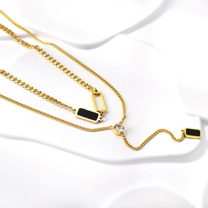 Double-layered 18K gold plated stainless steel necklace with black rectangle pendant