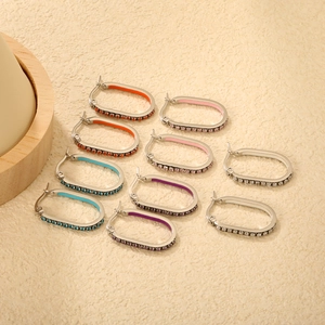 Oval stainless steel hoop earrings with colorful rhinestones in five vibrant color sets