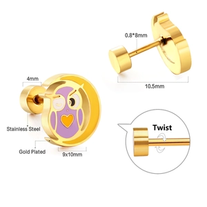 Detailed macro view of gold plated owl moon stud earrings with screw back design