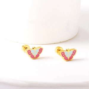 Detailed view of butterfly stud earrings with pink and blue enamel on gold-tone metal