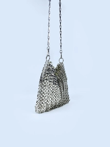 Handmade oversized silver chain mail evening bag with polished metal rings and strap