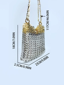 Detail showing the intricate metal sequin weave and two-tone gold and silver pattern