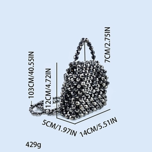 Detail view of handmade beaded crossbody bag in dark gray with dimensions and sizing info