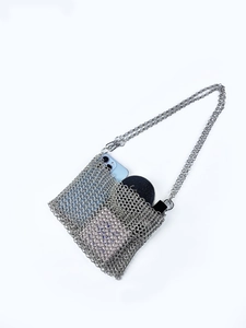 Sparkling silver metal chainmail crossbody bag with chain strap and phone storage