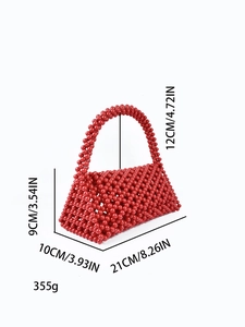 Detail showing red beaded handmade bag dimensions 21cm by 10cm and structural design