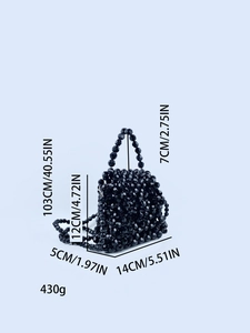 Detail showing dimensions of black handmade beaded handbag with crossbody strap