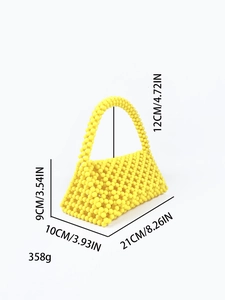 Detail view of yellow beaded handbag with dimensions 21x10x9cm and 12cm handle height