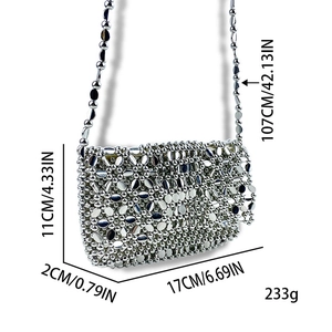 Detailed view of silver beaded bag showing 17x11x2cm dimensions and metal strap length