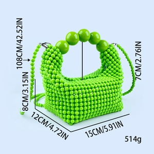 Detailed view of handmade green beaded bag showing 15x12x8cm dimensions and chain length