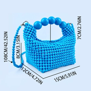 Detailed size specifications for the blue beaded handbag with dimensions in CM and inches